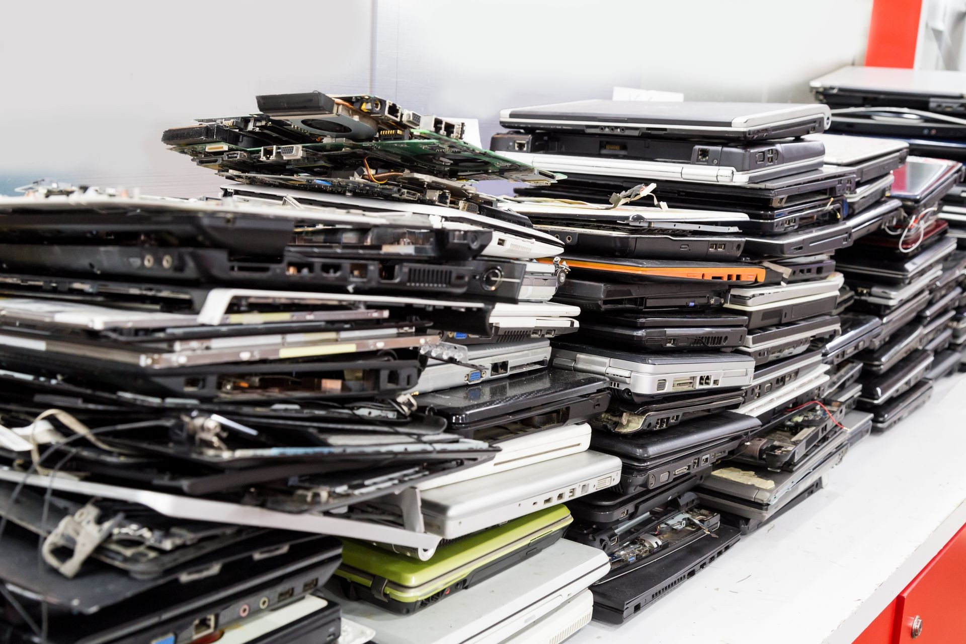 Stack of old, broken and obsolete laptop pc computer for repair and recycle