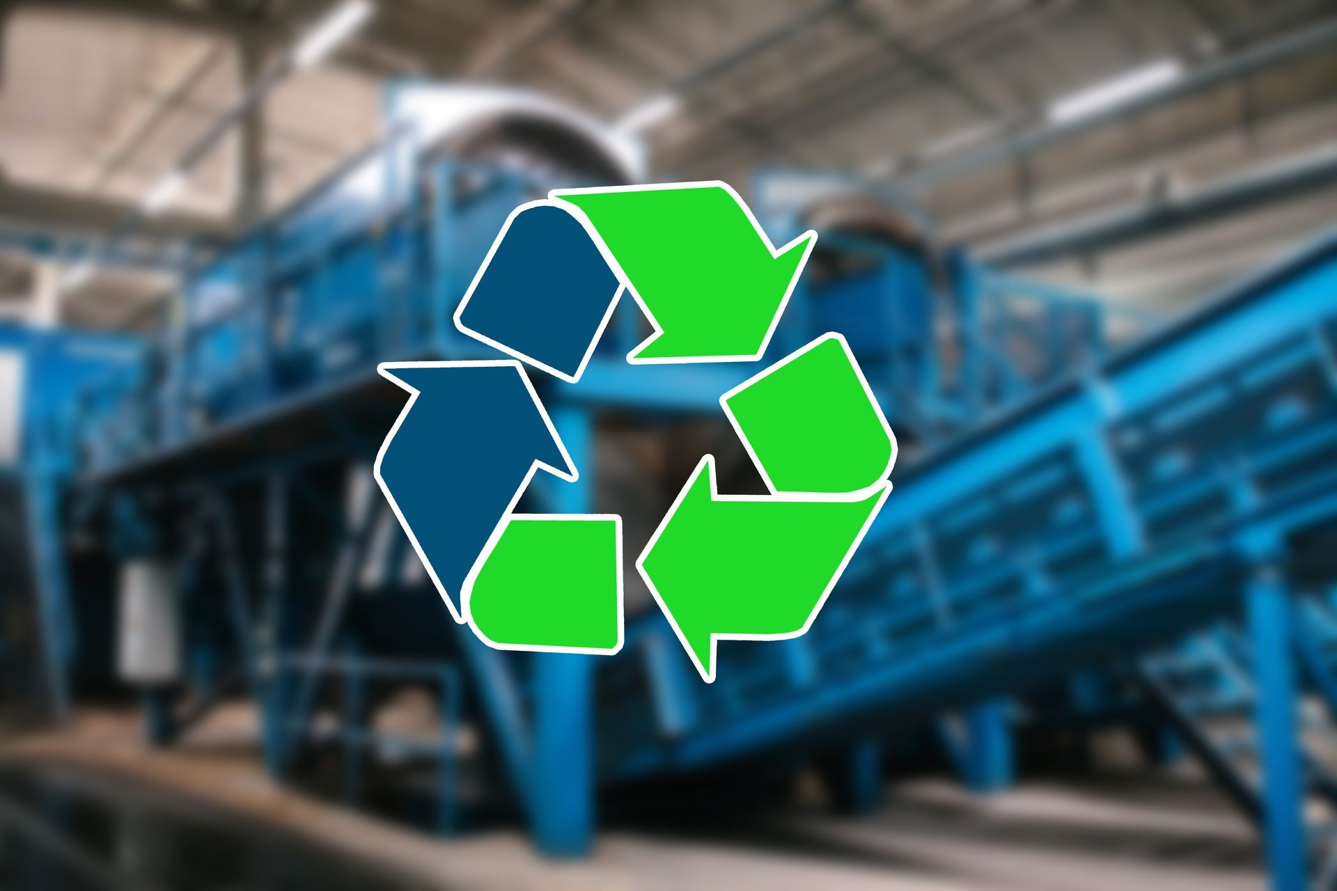 Sign recycling waste. The waste sorting and processing plant is blurry in the background